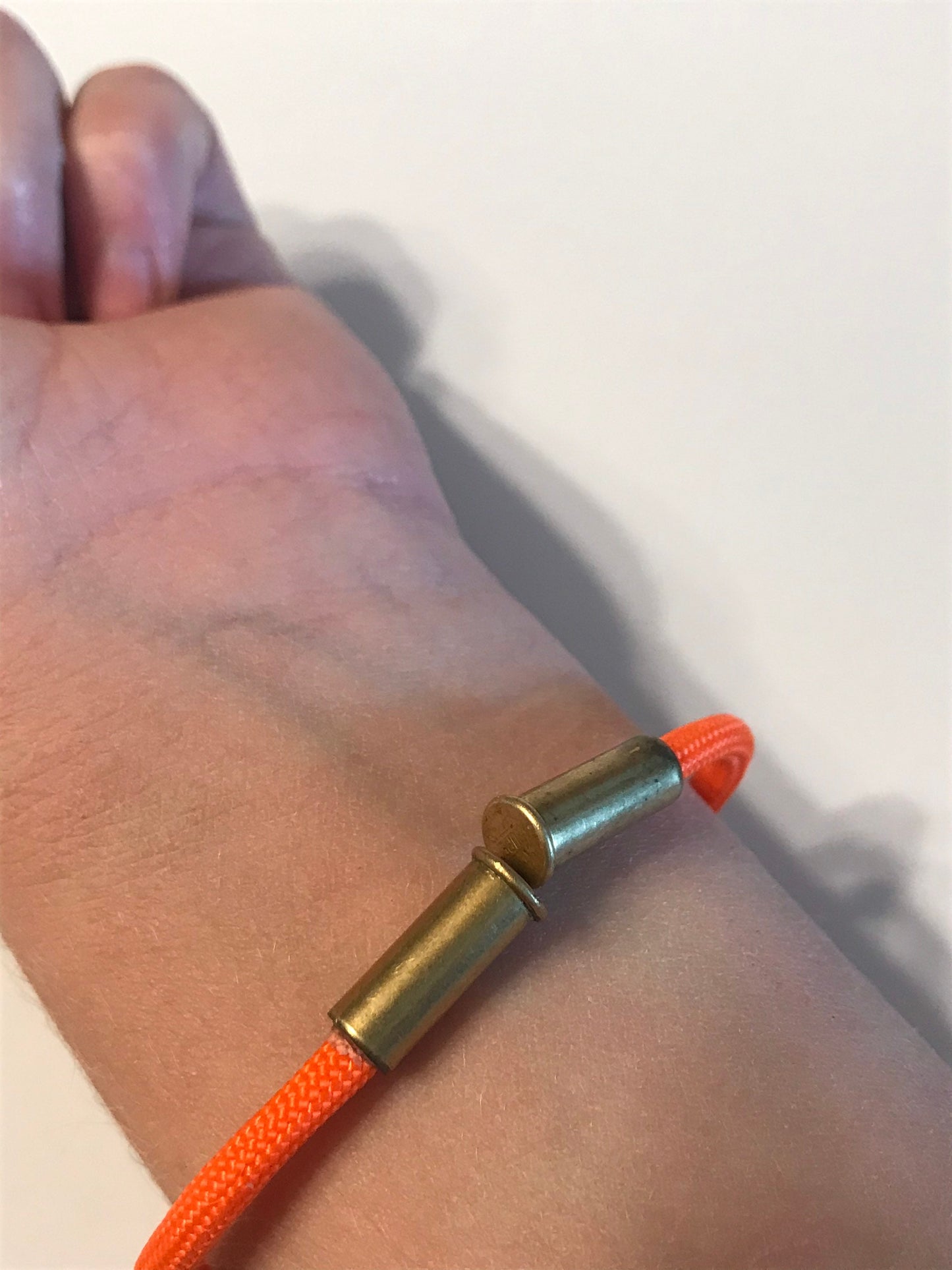 Paracord bracelet with recycled .22 shells