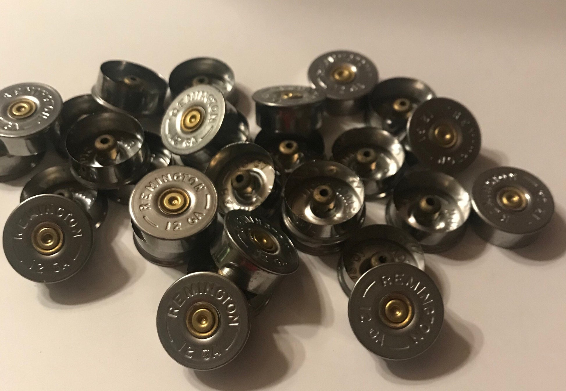 100 qty - 12 gauge Shotgun Shell end cap Head Stamp